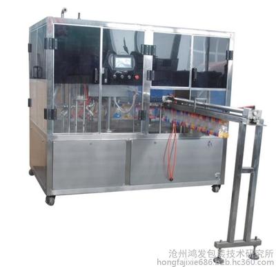 供应鑫鸿发牌全自动豪华型吸嘴自立袋灌装机 专业豆浆豆奶包装解决方案